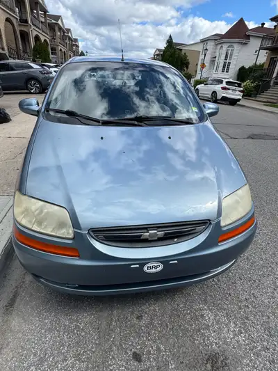 This is a 2006 Chevrolet Aveo, an economical hatchback, perfect for city driving and saving on fuel!...