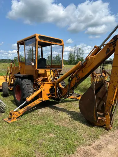 I have an older case 690ck backhoe. Has a case 267D diesel engine that runs very well Great for arou...