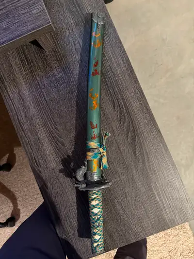 Replica Japanese wakizashi sword. Mint condition, acquired in Europe 18 years ago. Full tang constru...