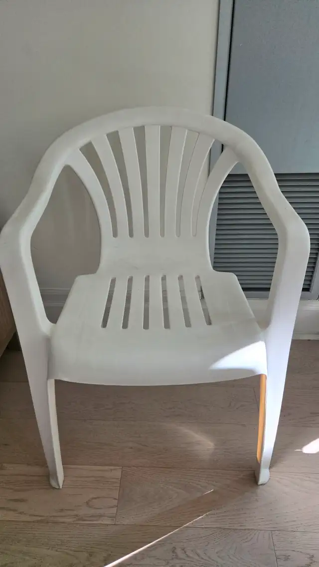 Two white fiber chairs at 20 CAD63235066788609122
