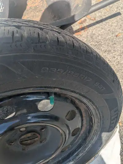 Goodyear Ultragrip 235 / 55R17 with steel rims and TPMS sensors off of a 2017 Ford Escape SE. Rims a...