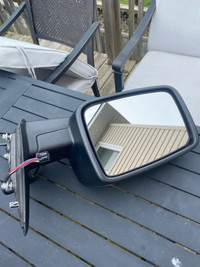Drivers side heated mirror for a 2014 Ram 