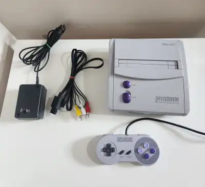 Pickup in Old St. Vital. Tested and working. Includes: - 1 official SNES controller - All necessary...