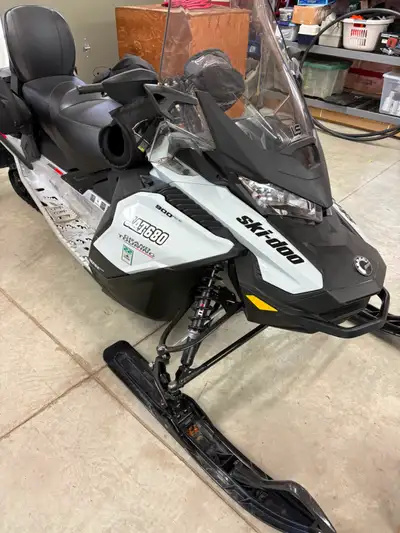 Rare find, a 2021 Grand Touring Sport 900 ACE, in showroom condition with only 700 km. Heated visor...