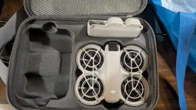 DJI Neo w/ three batteries, fast charger and stealth propellers, View more