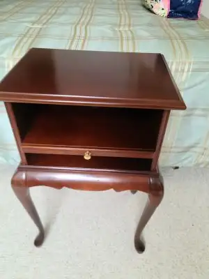 This telephone table is in very good condition. No scratches or marks. 25" high x16" wide x 12" deep...