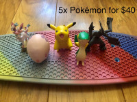 5x Pokémon figures.