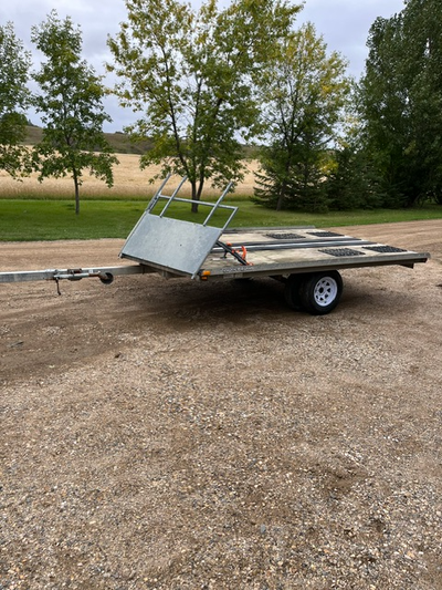2009 Yacht Club trailer. Ride on ride off, hidden ramp under deck. Brand new tires and rims, fold aw...