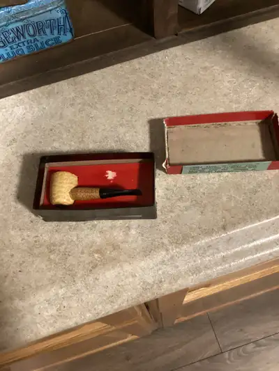 Small pipe in box, View more