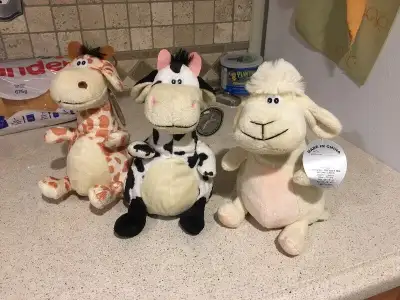 Three Stuffed Cow Toys $25, View more