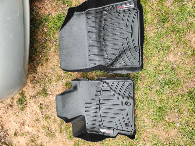 Weather tech front floor mats for a 2008 toyota yaris sedan  in Other Parts & Accessories in Cole Harbour