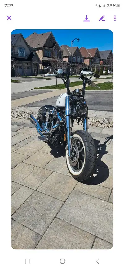 For sale is a 2004 Yamaha Road Star Custom motorcycle, featuring a unique bobber aesthetic with cust...