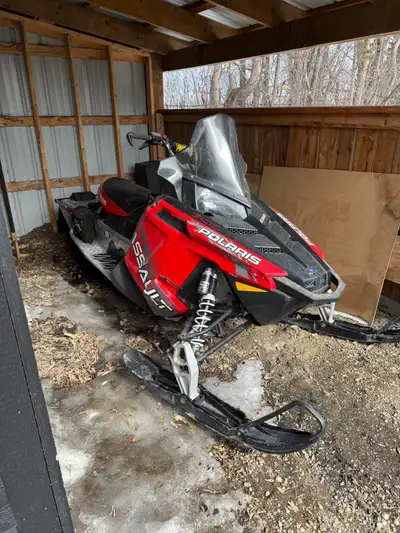 I'm selling a 2014 Polaris Assault, a high-performance snowmobile designed for both on-trail and off...