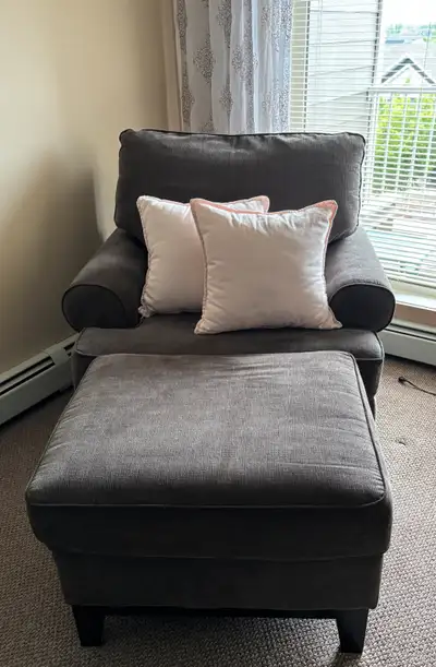 Grey chair and ottoman for sale. In like new condition. Non smoking household. No pets. $350 or best...