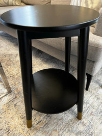 Elegant Pair of Black Wooden Side Tables with Gold leg Trims.