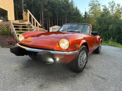 This is 1975 spitfire. The engine needs work. However the body was fully restored and it is in mint...