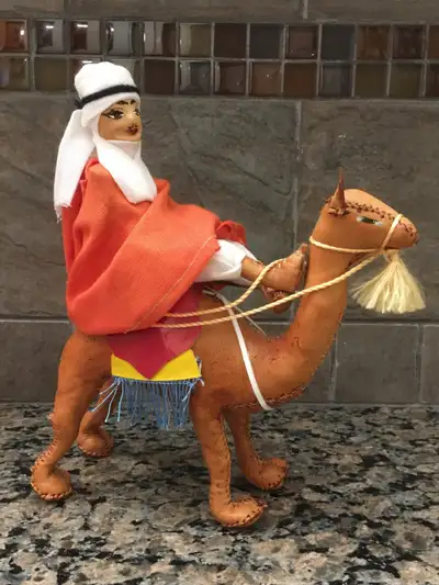 Gorgeous vintage handsewn leather Moroccan Camel Rider. This doll is from the early 1980s. The detai...