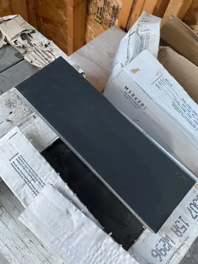3 unopened boxes of black cinca smooth glossy tile