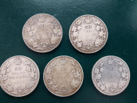 Five Canadian Silver Half Dollars over 100 years old.