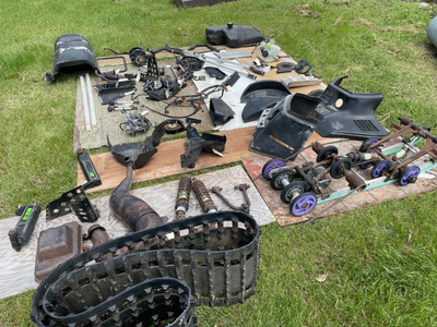 Parts for a 1991 EXT 550 arctic cat sled and 1981 srx 440. Track in the picture is sold. Handle bars...