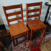 Pair of solid wood dining chairs