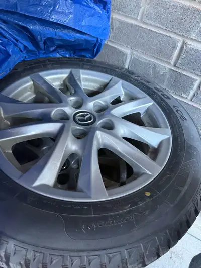These used winter tires and genuine Mazda rims are ready to tackle the cold weather and provide reli...