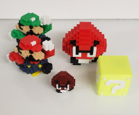 8-bit Mario & Luigi figures
