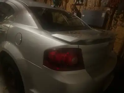 Dodge avenger 2011 as is* Just got brand new paint job and windows in 2021 Comes with 4 winter tires...