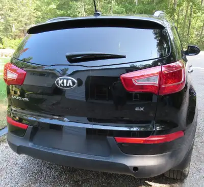 KIA SPORTAGE FOR SALE ,CRUISE CONTROL, REAR CAMERA, COMPLETE ENGINE REBUILD WITH OEM PARTS CRANKSHAF...