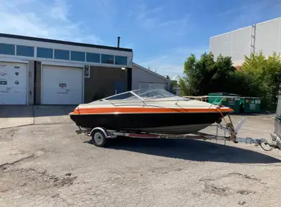 1995 Maxum 2000sc The boat has a burgundy hull with white top. It currently has a black and orange m...