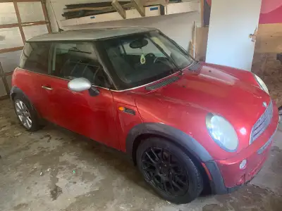 2006 Mini Cooper two door coupe for sale. Fuel efficient, leather interior, heated seats, sunroof an...