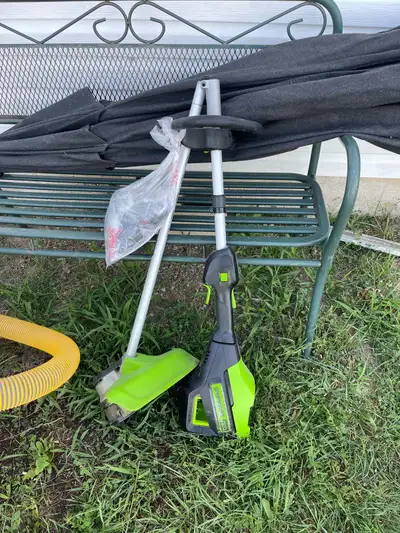 light up umbrella and green works trimmer, View more