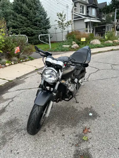 Selling a 2004 Honda CB599 Has an integrated taillight, bar end mirrors, aftermarket levers, engine...