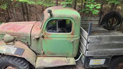 This classic Dodge Power Wagon is a vintage project truck, perfect for a restoration enthusiast look...