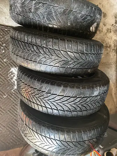 I'm selling a set of four Goodyear WinterCommand Ultra winter tires, size 235/60R18 107H. These tire...
