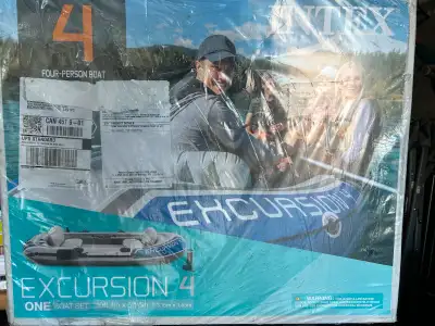 Unwanted gift, brand new with still in original packaging. 4 persons paddle boat. Motor can be attac...