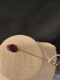 Red and Blue and Gold Tone Stick Pin