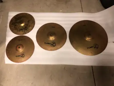 Planet Z Cymbal Set Selling some Planet Z beginner cymbals to get you started. 14” hi hats 16” crash...
