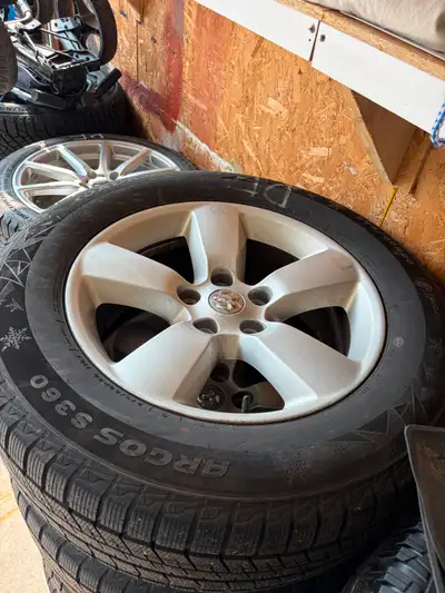 full set of stock dodge ram rims with brand new tires with tpms from a 2022 classic warlock fits all...