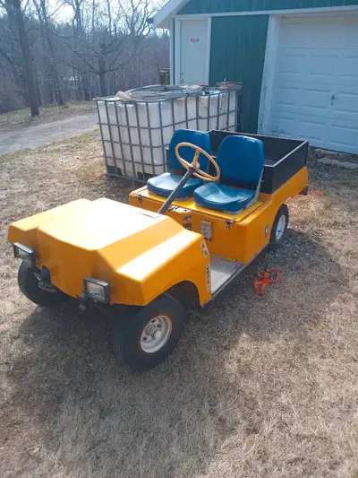 Electric utility cart, don't know too much about it. Has a GM equipment number and tag so presumably...