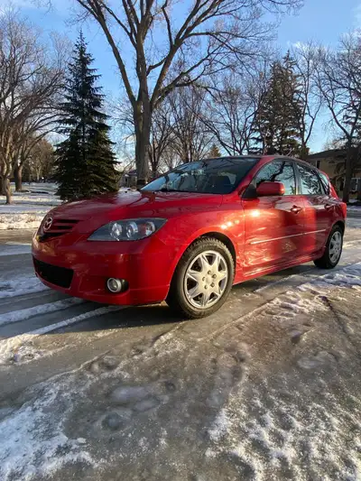 Red 4 dr hatchback, one owner, fwd, 4 cyl gas, AT, A/C, am, fm, cd, black cloth manual seats, winter...
