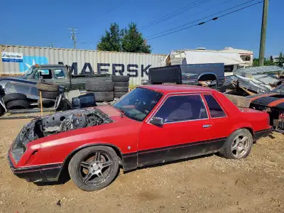 This used 1979 Ford Mustang is a project car with a striking red exterior and a classic coupe body s...