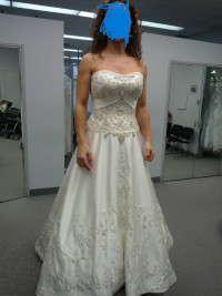 A wedding dress, ivory color, size 6 -8