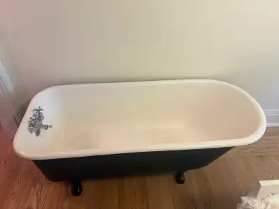 Claw foot bath tub, View more