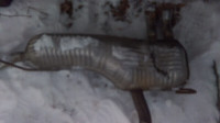 Muffler (with 4 tail pipes) + short section of exhaust pipe $10