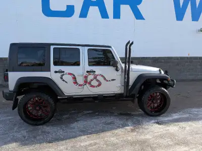 Jeep Wrangler lifted back up camera navigation system sub system active Very good on gas.trrades are...