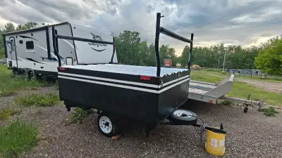 Trailer used for camping, hauling canoes, kayaks or paddleboards. New tires, wiring, lights. $1500 o...