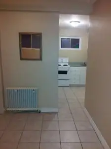 Clean, bright and independent bachelor apartment on the Main Floor of a newly renovated detached 4-p...