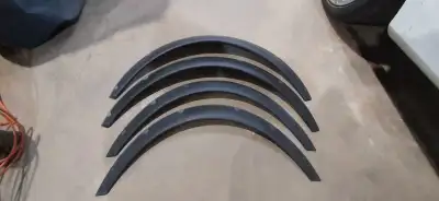 Two fronts, two rears. Flexible plastic unlike the fibergass ones. $40 never been used.