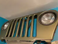 GREAT CONDIITON JEEP TJ GRILLE OR BEST OFFER